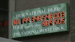 stock-footage-new-york-ny-circa-march-the-national-debt-counter-displays-how-much-money-america-owes-and